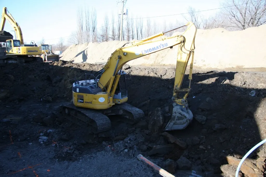 Excavator in a foundation dig